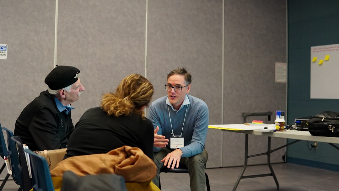 Crafting Captivating Headlines: Your awesome post title goes here three-people-talking-in-a-casual-meeting-tog6ibh2bdk